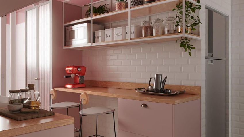 A cozinha rosa integrada com a lavanderia do projeto #QtMaurilio, da Quattrino Arquitetura/ Divulgação